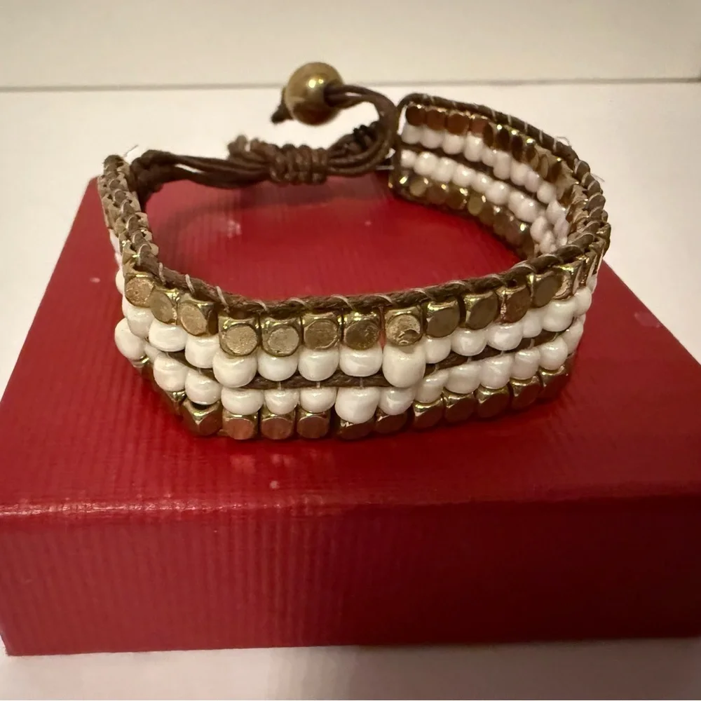 NEW BRACELET BEADED WHITE AND GOLDEN WITH BROWN STRING CINCH TIE